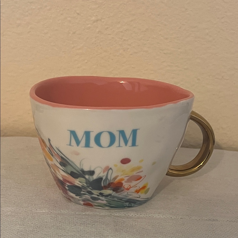 Faithworks 12 oz Artisan Mug with a "Mom Flowers" design.